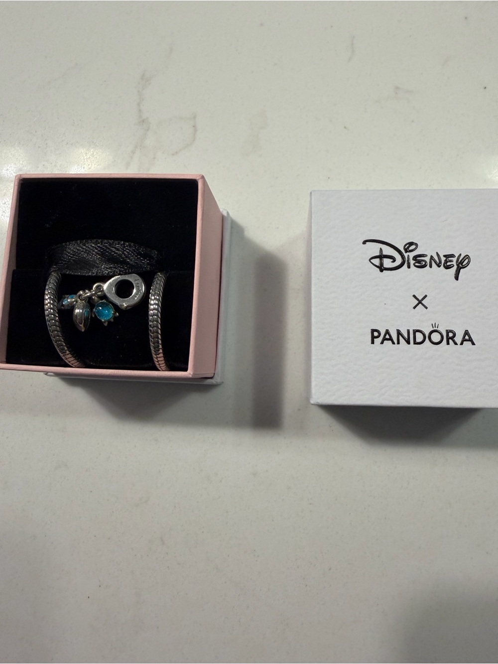 Disney Pandora Silver Charm earrings Blue Teal turtle, fish and shell charm.